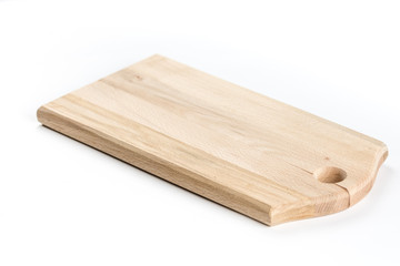 Brand new wooden cutting board isolated over white background