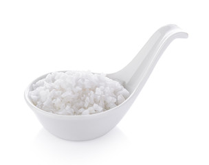 salt in spoon on white background