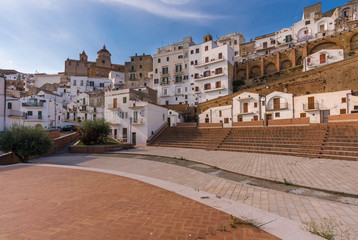 Fototapeta premium Pisticci (Matera, Italy) - A white town on the badlands hills, in province of Matera, Basilicata region, southern Italy