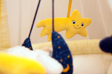 Baby mobile toy focusing on a star