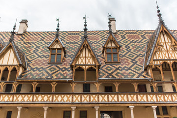 Fototapeta na wymiar Beaune in Burgundy, roof of the Hospices, detail 