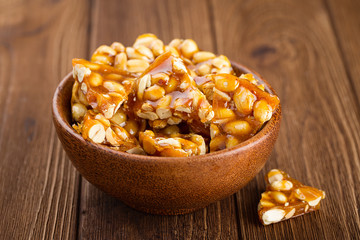 Bowl of homemade kozinaki made from peanuts