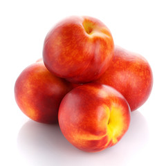 Fototapeta na wymiar Ripe red peaches isolated on a white background.
