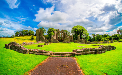 Inch Abbey in Northern Ireland. Monastery ruins in Downpatrick. Co. Down. Travel by car in summer.