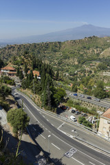 The town of Taormina in Sicily with the Mount Etna in the background