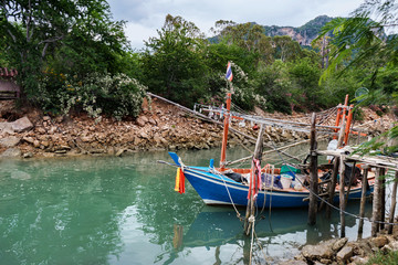 Fototapeta na wymiar Small fishing boats at fishing village
