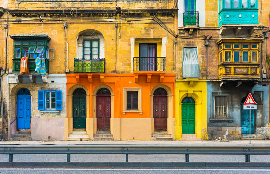 Malta, Valletta: Facade of a residential house with traditional maltese balconies.