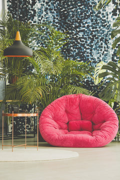 Room with pink armchair