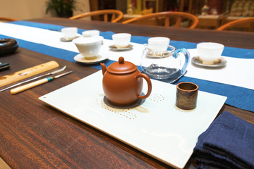 set for tea ceremony on a wooden table, horizontal