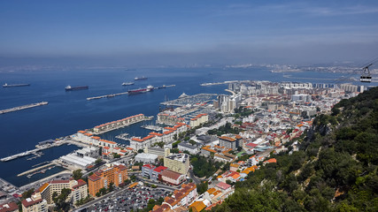 Fototapeta premium an aerial view of Gibraltar, its marina and the Mediterranean sea as seen from the Rock of Gibraltar