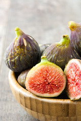 Fresh figs on wooden background
