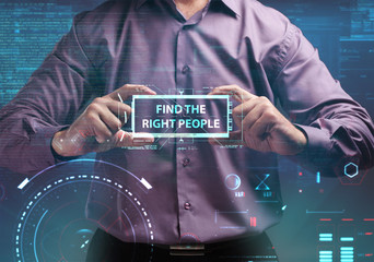 Business, Technology, Internet and network concept. Young businessman working on a virtual screen of the future and sees the inscription: Find the right people
