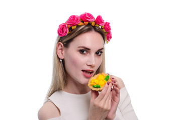 girl in white blouse with cake