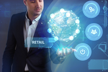 Business, Technology, Internet and network concept. Young businessman working on a virtual screen of the future and sees the inscription: Retail