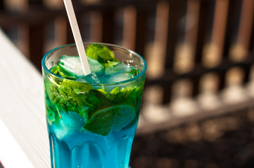 Tradition Summer drink blue mojito with lime mint and ice