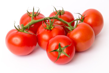 fresh red tomatoes isolated on white