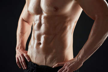 Fototapeta na wymiar close up of man or bodybuilder with bare torso