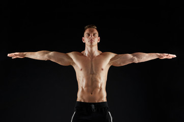 Fototapeta na wymiar young man or bodybuilder with bare torso