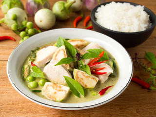 Chicken green curry with eggplant and hot chili famous traditional  Thai food.