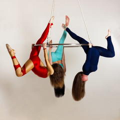 Woman`s trio on aerial luster