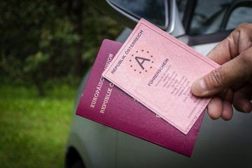 driver shows his driver licence and passport