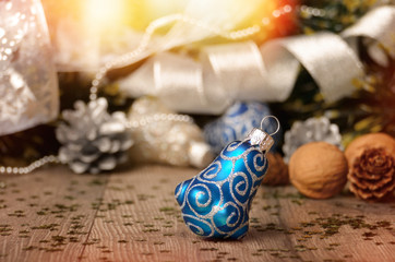 Christmas background of nuts stripes and decorations