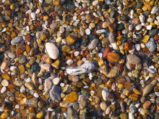 small wet colorful pebble stones background