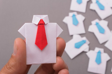 Leader in the team building. Staff recruitment, Human Resources Employment Job. Office workers in a shirt and tie. origami. Copy space for text