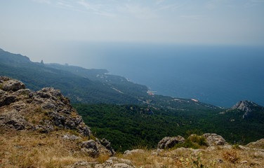 Fototapeta na wymiar Mountain landscape. View of the sea and the green mountains in the Crimea.