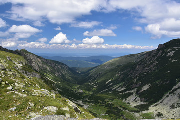 Fototapeta premium View from Malyovitsa highs down to Malyovitsa hut and Mecha Polyana, Rila Mountains, Bulgaria