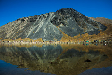 Mountains reflection on a lake at Nevado de Toluca Mexico