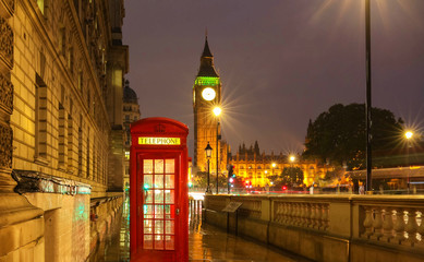 Obraz na płótnie Canvas The Big Ben tower at rainy night, London, United Kingdom.