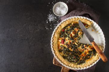 Homemade cheese Quiche egg for brunch with spinach and chard