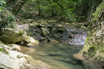 Naklejka na ściany i meble Waterfall on a Mountain River of Crimea