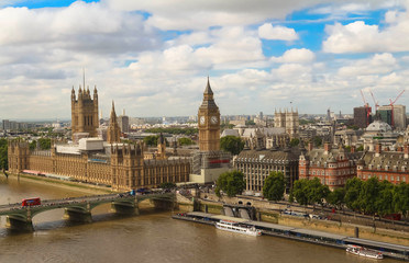 Fototapeta premium The panoramic view of Big Ben tower and Westminster Bridge in London.