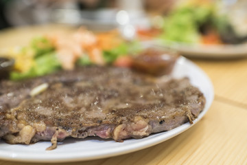 Beef steak with vegetable salad dressing