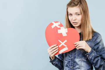 Young woman with broken heart