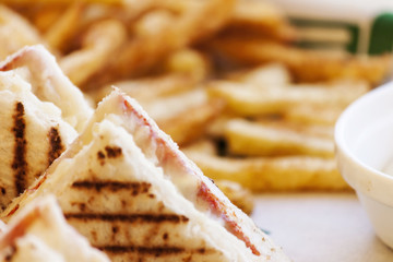Fast food: Toast with cheese and french fries