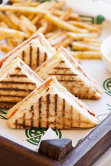 Fast food: Toast with cheese and french fries