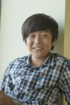 Portrait Of Smiling Asian Boy