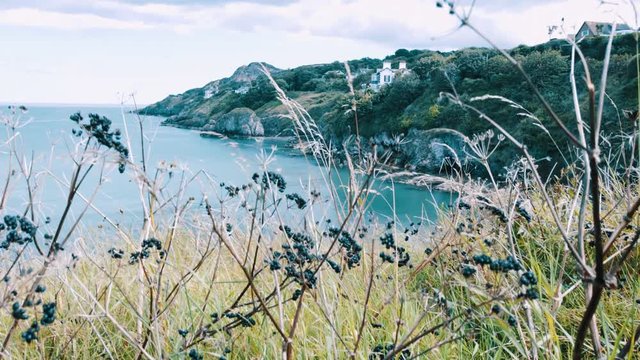 Low Prospective of a Man Hiking in Howth Tracking. Ireland Landscape