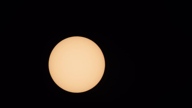 4K Sun with Sunspots Through Solar Filter