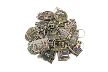 Metal key chain is souvenir from singapore sign isolated on white background.