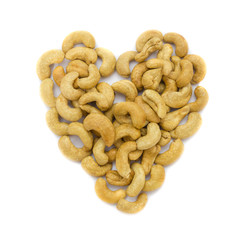 Heart cashew nuts isolated on white background. Concept food image love cashew nuts.