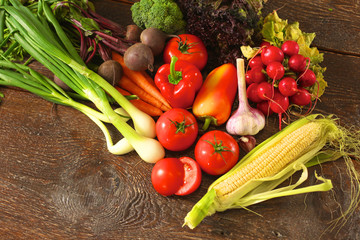Fresh vegetables on a wooden table. Healthy food. Diet