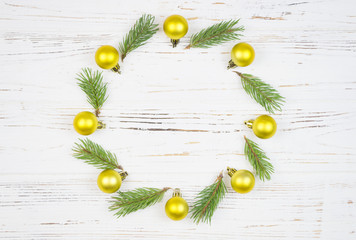 Christmas Round Frame with fir tree, on rustic wood, copy space for text. New Year background