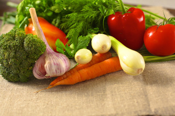 Fresh vegetables on a wooden table. Healthy food. Diet