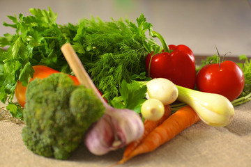 Fresh vegetables on a wooden table. Healthy food. Diet