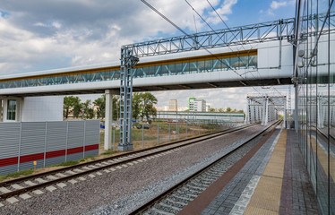 Fototapeta premium Railway in the city limits for high-speed passenger transport 