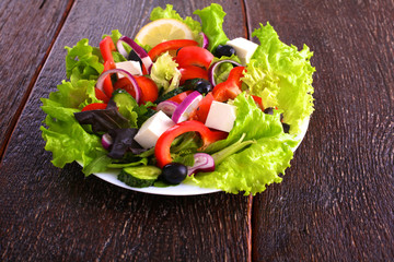Fresh vegetables on a wooden table. Healthy food. Diet